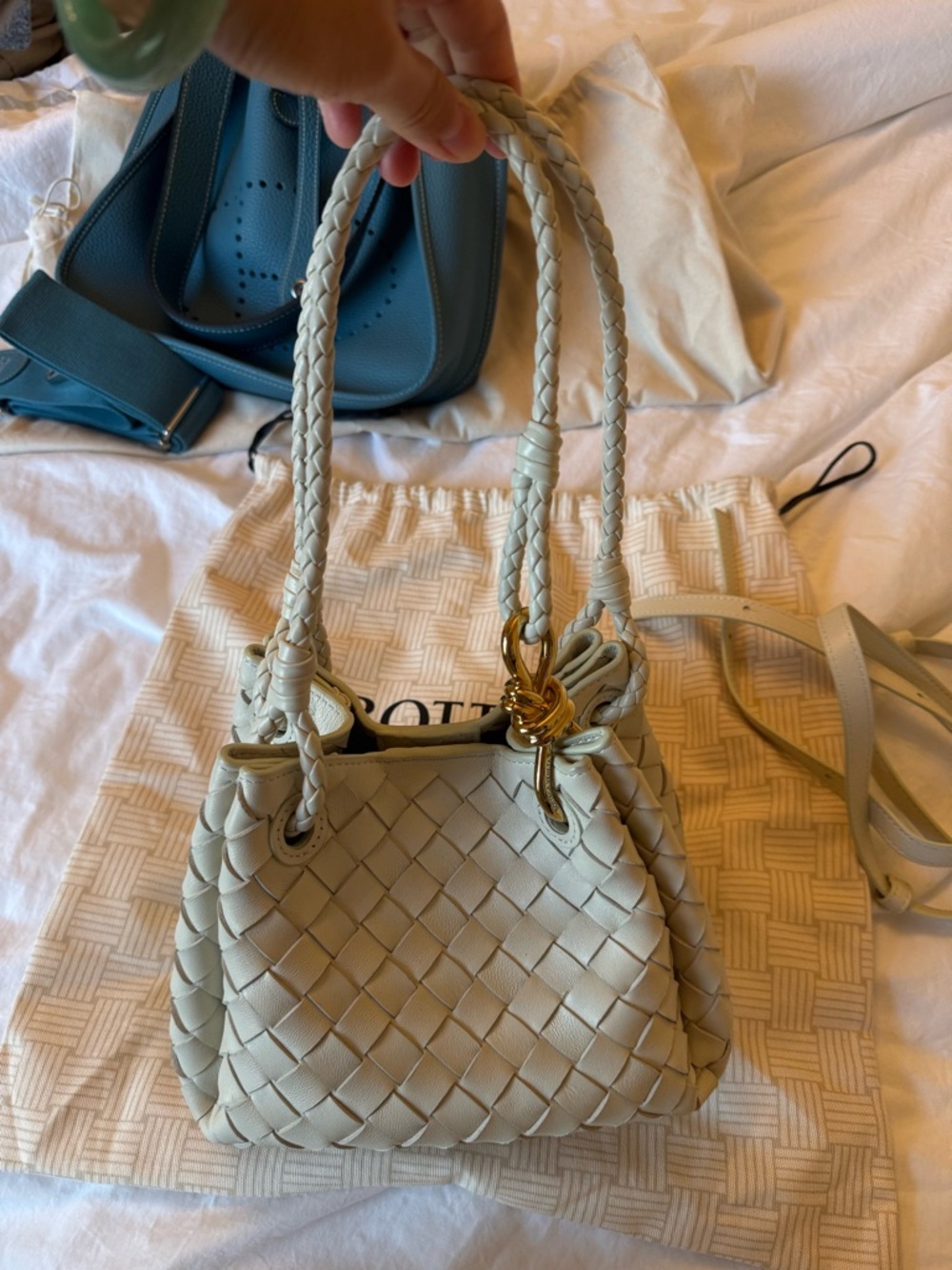Woven Leather Drawstring Shoulder Bag in white Cream color